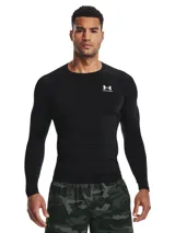 Remera de compresión Under Armour de manga larga, color negro, con cuello redondo y logo de la marca estampado en el pecho. Diseñada con tecnología HeatGear para absorción de sudor y paneles de malla para ventilación.