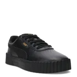 Championes Puma Carina 3.0 Animal Flair de estilo urbano, confeccionados en cuero sintético negro con suela de plataforma robusta y texturizada. Presentan el logo de la marca en dorado en el lateral y cordones al tono.