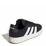 Championes urbanos Adidas Grand Court Alpha, color negro con las tres tiras blancas, confeccionados en material sintético con suela de goma.