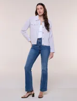 Camperita de lino liviana, marca Dash, con estampado botánico de hojas en tonos azules, verdes y tostados sobre base blanca. Presenta cierre frontal con botones, cuello clásico y bolsillos aplicados en el pecho.
