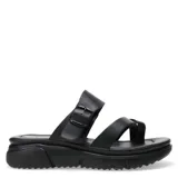 Sandalias de mujer con diseño de tiras cruzadas y ajuste mediante hebilla lateral. Presentan una suela de plataforma blanca con relieve y plantilla anatómica, ofreciendo un estilo casual y cómodo.
