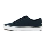 Zapatillas Osiris Champion de lona azul marino con logo plateado en el lateral y suela blanca con línea azul.