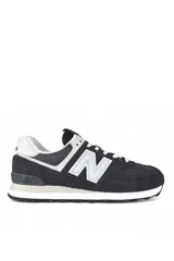 Championes deportivos New Balance modelo 574, color verde con detalles en gris y blanco, confeccionados en gamuza y malla, con el logotipo "N" característico en los laterales y entresuela ENCAP.