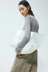 Body colaless de manga larga y escote cuadrado, confeccionado en punto elástico de color gris.