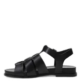 Sandalias tipo franciscanas de cuero gamuzado color marrón, con tiras anchas entrelazadas, cierre lateral con hebilla metálica y suela plana negra.