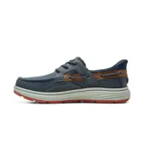 Zapatos casuales Skechers modelo Slip-ins Relaxed Fit Troutt Davey, de estilo náutico, color azul marino con detalles en marrón y suela tricolor.