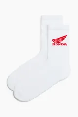 Medias blancas de caña alta con el logo de Honda bordado en rojo.