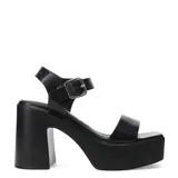 Sandalias de tacón alto y plataforma con diseño de tira ancha en la parte delantera y tira en el tobillo con hebilla metálica. Modelo Miss Carol Rivex.