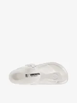Sandalias Birkenstock modelo Gizeh, fabricadas en goma EVA color blanco, con tira de dedo y hebilla ajustable.