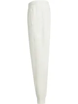 Pantalón de jogging blanco de algodón, modal y poliéster, con cintura elástica, tobillos con punto canalé, bolsillos laterales, talle medio e insignia con logo de Calvin Klein.
