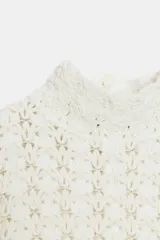 Jersey de punto con cuello subido y manga larga, confeccionado con un diseño de tejido combinado que presenta una textura calada y delicada.