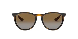 Lentes de sol Ray-Ban modelo Erika, con montura redonda de acetato color carey y lentes marrones degradadas.