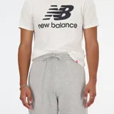 Pantalón de jogging gris melange de tejido elástico, con logo bordado, bolsillos con cremallera, bajo elástico y cordón de ajuste interno.
