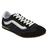 Championes Vans modelo Super Low Pro, de perfil bajo, color negro con detalles en blanco. Presentan la icónica banda lateral Sidestripe, cierre de cordones y suela de caucho con diseño Waffle.