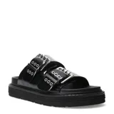 Sandalias de plataforma plana Miss Carol modelo Mavic, color negro, de estilo chunky con dos tiras anchas en el empeine decoradas con hebillas metálicas y ojales plateados.