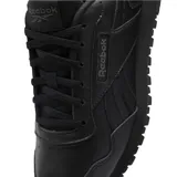 Championes Reebok modelo Glide, color negro, con diseño clásico de corte bajo, confeccionados en una combinación de cuero natural y sintético, con entresuela de EVA y suela de goma.