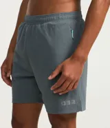 Bermuda deportiva Get Over para hombre, de color negro, con cintura elástica, cordón de ajuste y bolsillos laterales.