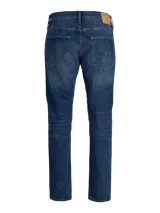 Jean de corte tapered fit con tiro medio, confeccionado en denim con efecto lavado. Presenta diseño clásico de cinco bolsillos, cierre con cremallera y costuras reforzadas.