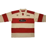 Polo de manga larga color crema con rayas horizontales rojas. Tiene cuello clásico con botones, bordados en el pecho y en la manga, y un parche ovalado con la palabra "Septum" en el centro.