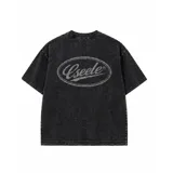 Remera oversize de algodón con acabado stonewash y efecto desgastado, con logo ovalado retro estampado en la espalda.