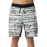 Short de baño Rip Curl modelo Sseries 32One Cordura, con estampado multicolor de diseño geométrico y tribal sobre base blanca, cintura negra con cordón ajustable y detalles negros en los laterales.