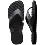 Chancletas Havaianas modelo Track Waves de color negro, con diseño texturizado en relieve de ondas en la suela y tiras anchas grises con el logo de la marca en relieve.