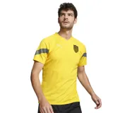 Camiseta de fútbol amarilla de entrenamiento del Club Atlético Peñarol, marca Puma, temporada 2022.