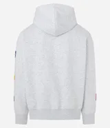 Buzo tipo hoodie con corte boxy, confeccionado en algodón con fondo melange. Presenta capucha, bolsillo canguro frontal, puños y ruedo acanalados, y múltiples parches bordados decorativos en el frente y las mangas.
