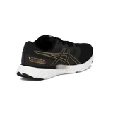 Championes de running Asics modelo Fuzeblast, color negro con detalles en dorado. Presentan capellada de malla transpirable, logo lateral característico y entresuela blanca con amortiguación.