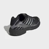 Championes Adidas Adistar Control 3 de color negro con detalles plateados, confeccionados con malla perforada y rayas sintéticas.