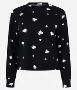 Blusa de pijama de manga larga con cuello redondo y puños ajustados, confeccionada en tejido suave con estampado integral de Snoopy y corazones pequeños.