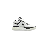 Championes Amiri MA-1 Low-Top en colores blanco y negro, con diseño de caña baja, paneles de malla y cuero, suela gruesa y cordones anchos.
