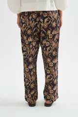 Babucha de viscosa con estampado floral en tonos marrones y beige, de corte recto y ajuste cómodo.