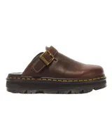 Zuecos Dr. Martens Zebzag de cuero marrón, con tira ajustable con hebilla metálica y suela plataforma dentada con las características costuras amarillas.