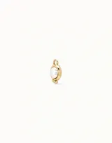 Dije de piercing dorado con forma circular y cristal celeste.