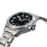 Reloj análogo Casio para mujer, modelo LTP1308D-1BVDF, con caja y pulsera de acero inoxidable plateado. Presenta una esfera negra con números arábigos blancos y manecillas plateadas. Incluye visualizador de fecha a las 3.
