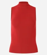 Blusa de punto acanalado color blanco, sin mangas y con cuello alto, de corte ajustado al cuerpo.