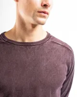 Buzo de punto color gris azulado, de algodón con cuello redondo y mangas largas.