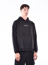 Buzo hoodie negro con bolsillo canguro y cordones ajustables. Estampado con la frase "YOU DON'T HAVE TO BE PERFECT TO START" en el pecho.