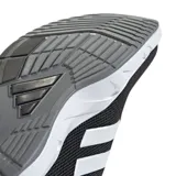Championes de entrenamiento Adidas modelo Amplimove Trainer, color negro con las icónicas tres tiras en blanco y suela blanca con diseño texturizado. Confeccionados en malla transpirable para mayor ventilación.