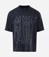 Remera de corte boxy en algodón color negro, con cuello redondo, mangas cortas y estampa frontal con lettering Guilt en color blanco.