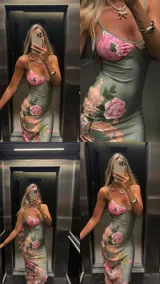 Vestido largo de tirantes finos, color verde con estampado floral en tonos rosados y beige.