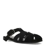 Sandalias planas Miss Carol Bruna de color negro, con diseño tipo romano de tiras cruzadas, hebilla metálica de ajuste lateral y pequeños detalles de tachas.