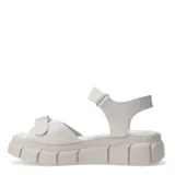 Sandalias de plataforma con diseño moderno, color blanco hueso, con doble tira ajustable mediante cierre de velcro en el empeine y el tobillo.