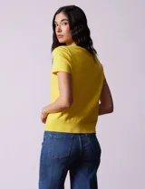 Buzo tejido en hilado fino color naranja, marca Ninety.