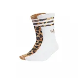 Medias adidas de caña alta con diseño animal print de leopardo, con detalles de franjas y el logo trébol de la marca.