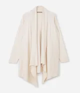 Cardigan de punto abierto con diseño alargado y puntas asimétricas. Presenta mangas largas, cuello tipo chal y detalles de textura acanalada en los laterales.