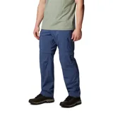 Pantalón convertible de senderismo color azul, diseñado con tecnología de secado rápido y protección solar. Cuenta con bolsillos cargo laterales, bolsillos de seguridad con cremallera y perneras desmontables mediante cremallera que permiten convertir la prenda en un pantalón corto.