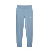 Pantalon de jogging Puma, color celeste, con cintura elástica, puños en los tobillos y logo de la marca estampado en blanco en la pierna izquierda.
