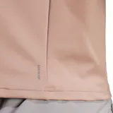 Buzo Adidas de training color rosa, con cierre corto y cuello alto. Confeccionado en poliéster reciclado y elastano, con tecnología Aeroready.